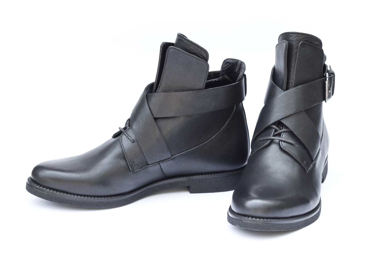 Pair of black female shoes isolated on white background